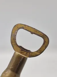 Oplukker lavet af 12,7 mm patron (Saint Louis Ordance plant)