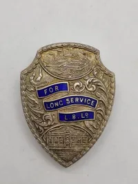 Originalt Engelsk sølvbadge givet til Dansker