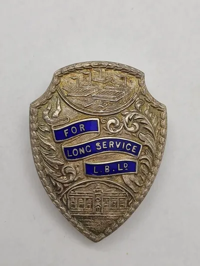 Originalt Engelsk sølvbadge givet til Dansker