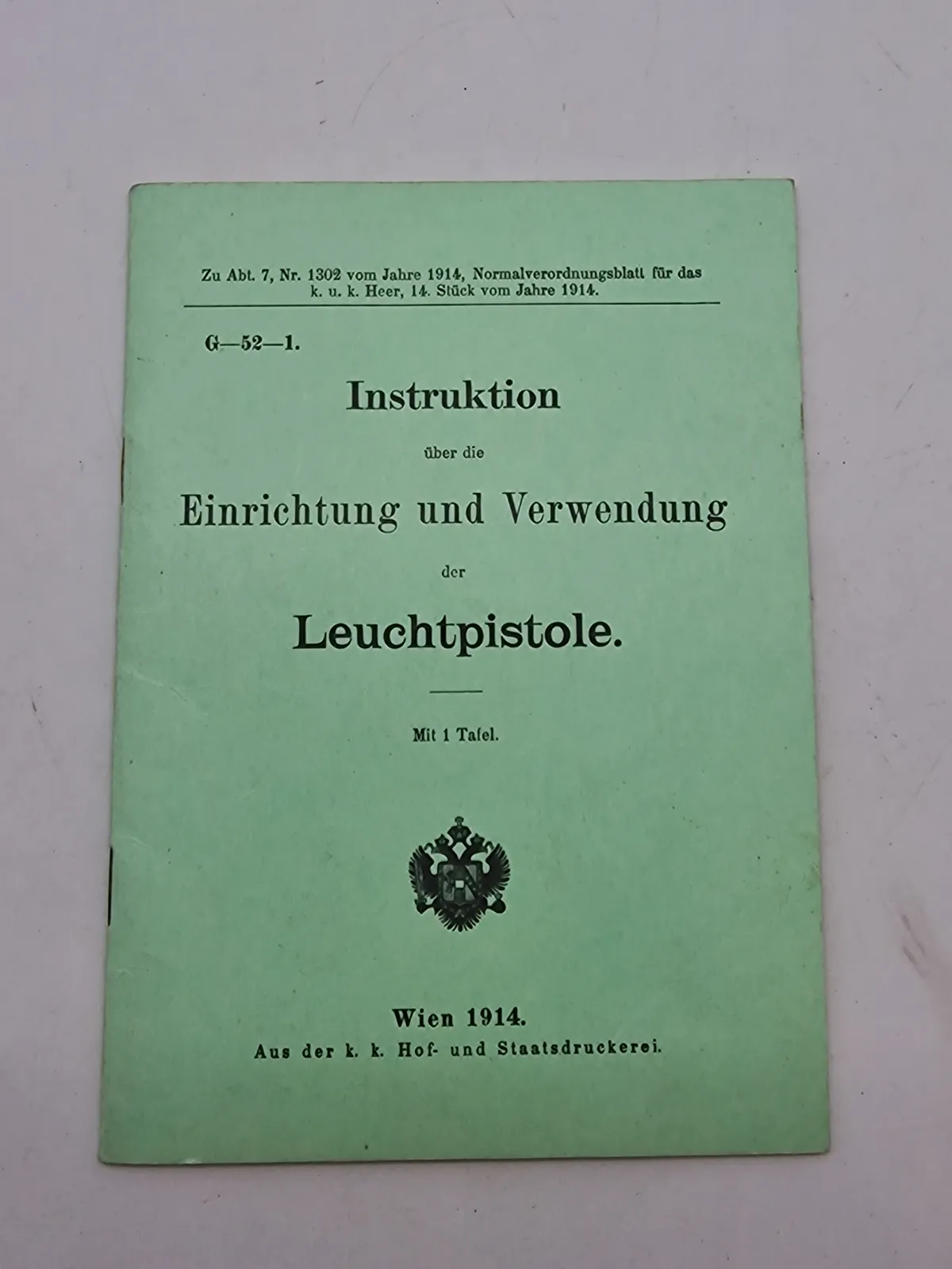 Instruktion
über die
Einrichtung und Verwendung
der
Leuchtpistole.
