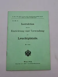 Instruktion
über die
Einrichtung und Verwendung
der
Leuchtpistole.