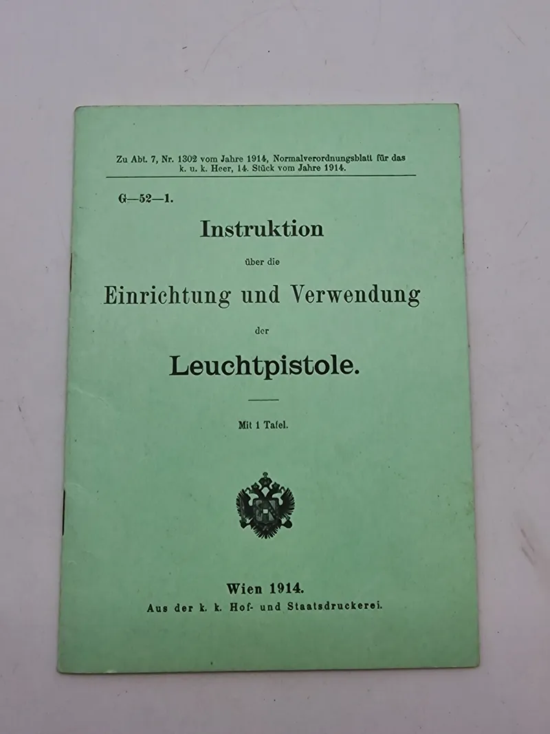 Instruktion
über die
Einrichtung und Verwendung
der
Leuchtpistole.