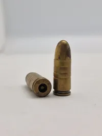 Originale danske 9 mm klikpatroner (bemærk den ene er PJJ stemplet, som betyder at den er produceret i dk under tysk kommando under ww2)