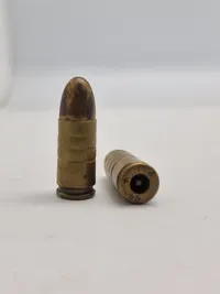 Originale danske 9 mm klikpatroner (bemærk den ene er PJJ stemplet, som betyder at den er produceret i dk under tysk kommando under ww2)