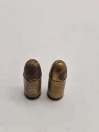 Originale danske 9 mm klikpatroner (bemærk den ene er PJJ stemplet, som betyder at den er produceret i dk under tysk kommando under ww2)