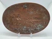Original 1864 plakette med Dybbøl mølle i baggrunden