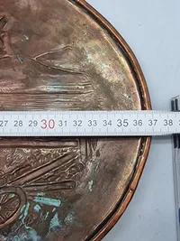 Original 1864 plakette med Dybbøl mølle i baggrunden