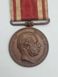 Original 1864 medalje, samt miniature dobbelt medalje