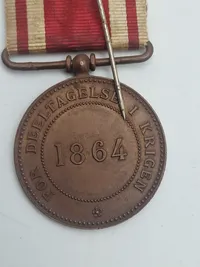 Original 1864 medalje, samt miniature dobbelt medalje