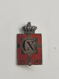 Samling Kong Christian X effekter, herunder kongemærker lavet af Georg Jensen
