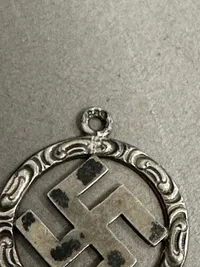 Originalt sympatisør halssmykke