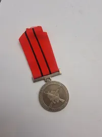 Original tanzanisk medalje tildelt for deltagelse i Uganda-Tanzania-krigen, også kendt som Kagera-krigen i Tanzania eller Befrielseskrig i Uganda.