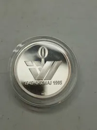 Mindesmønt 1945-1995, vægt 31 gram finsølv
