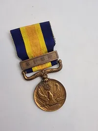 japansk "Jūgun Kishō" (従軍記章), som er en kampagnemedalje, der blev tildelt af det japanske imperium