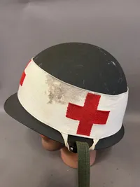 Original m1 hjelm med sanitets bånd