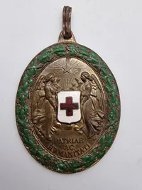 Original  østrigsk Røde Kors Fortjenstmedalje fra Første Verdenskrig, også kendt som "Decoration for Services to the Red Cross" (Ehrenzeichen für Verdienste um das Rote Kreuz).