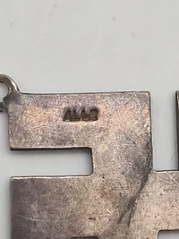 Engelsk Hagekors af Sterlingsølv fra 1911