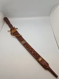 Ornate Indonesian Sword with Hand Carved Wooden Sheath