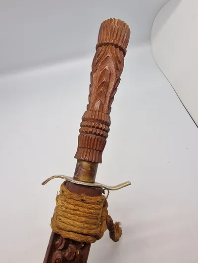 Ornate Indonesian Sword with Hand Carved Wooden Sheath