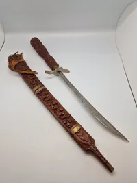 Ornate Indonesian Sword with Hand Carved Wooden Sheath
