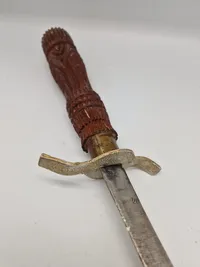 Ornate Indonesian Sword with Hand Carved Wooden Sheath