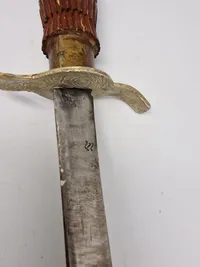 Ornate Indonesian Sword with Hand Carved Wooden Sheath