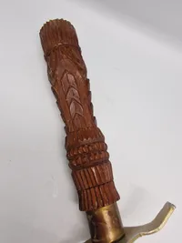 Ornate Indonesian Sword with Hand Carved Wooden Sheath