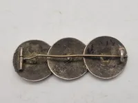 Broche lavet ud af bondeknapper - 1800 tallet
