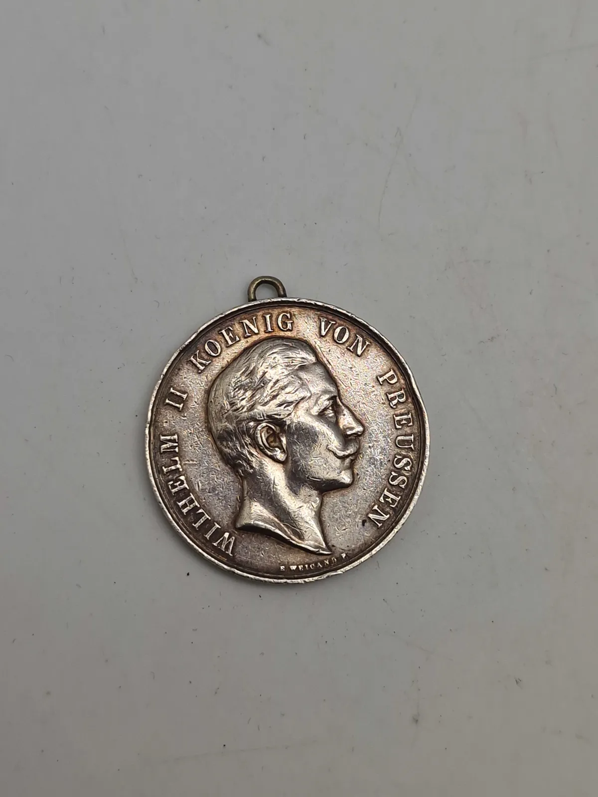 Original sølv medalje med teksten “Dem Besten Schützen”