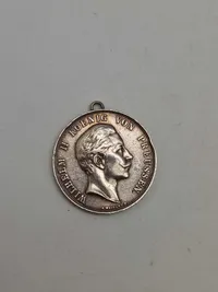 Original sølv medalje med teksten “Dem Besten Schützen”