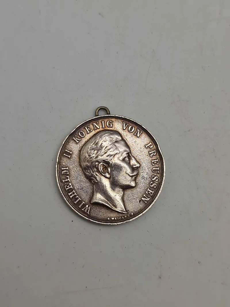 Original sølv medalje med teksten “Dem Besten Schützen”
