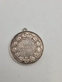 Original sølv medalje med teksten “Dem Besten Schützen”