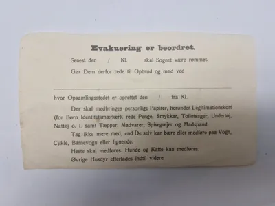 Original evakueringsseddel fra ww2 (Ubrugt)