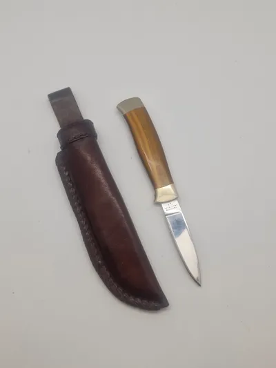 Dansk håndlavet kniv med greb af Tigerøje. Ekstremt veludført