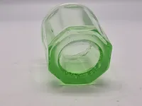 Børne  glas (Uraniumgrøn) 
Fyens Glasværk, Grønt børneglas, presset studsglas med planslebet standflade katalig 1934