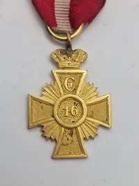Originalt Hæderstegn for 16 års tro tjeneste for underofficerer. Hæderstegnet er indført 12/1 1854