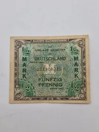 Allieret Militærvaluta (AM-Mark), specifikt en 1/2 mark (fünfzig pfennig) seddel fra 1944, udstedt af de Allierede Militærmyndigheder (Alliierte Militärbehörde)