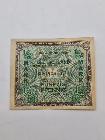Allieret Militærvaluta (AM-Mark), specifikt en 1/2 mark (fünfzig pfennig) seddel fra 1944, udstedt af de Allierede Militærmyndigheder (Alliierte Militärbehörde)