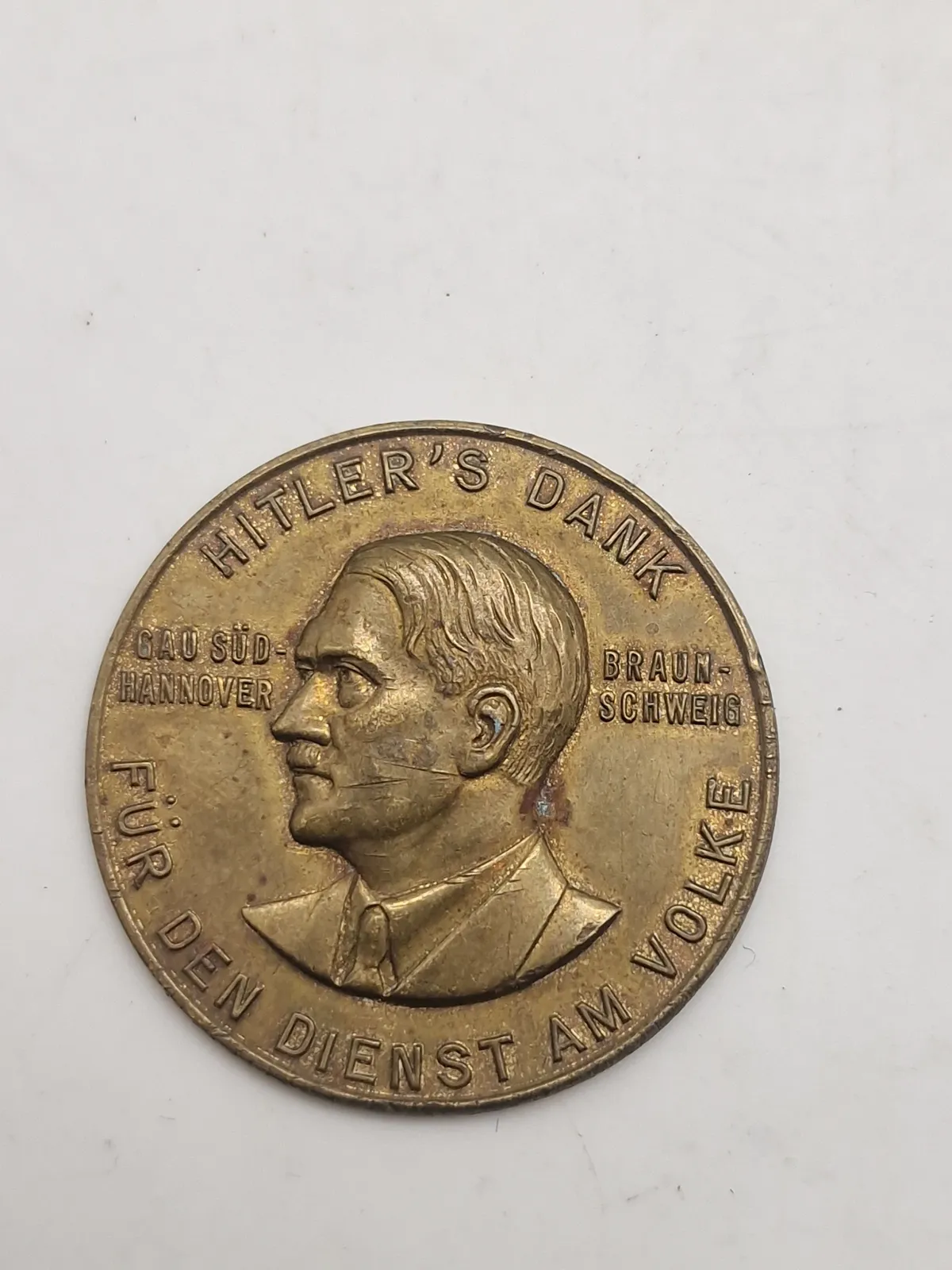 Original Hitler's Dank – Für den Dienst am Volke" medalje, som blev givet til frivillige i den første Vinterhjælpskampagne i Syd Hannover i 1933-34.