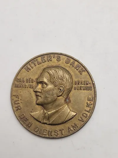 Original Hitler's Dank – Für den Dienst am Volke" medalje, som blev givet til frivillige i den første Vinterhjælpskampagne i Syd Hannover i 1933-34.