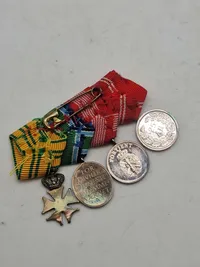 Original dansk ordensspange, med flere medaljer af sterlingsølv