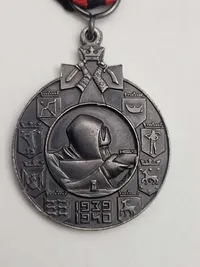 Original finsk medalje tildelt for Danskere udlændinge deltagelse i Vinterkrigen 1939-1940.