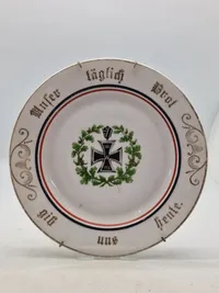 Original tysk ww1 tallerken med inskriptionen Unser täglich Brot gib uns heute." (Vores daglige brød giv os i dag.)