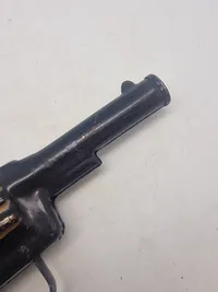 Helstøbt antik legetøjs revolver