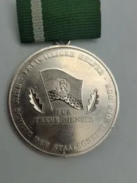 Medal 15 Years Volunteer to Protect the State Border of the GDR (2), & Medal for Faithful Service in the National People's Army