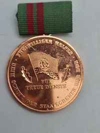 Medal 15 Years Volunteer to Protect the State Border of the GDR (2), & Medal for Faithful Service in the National People's Army
