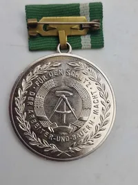 Medal 15 Years Volunteer to Protect the State Border of the GDR (2), & Medal for Faithful Service in the National People's Army
