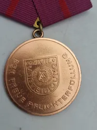 Medal 15 Years Volunteer to Protect the State Border of the GDR (2), & Medal for Faithful Service in the National People's Army