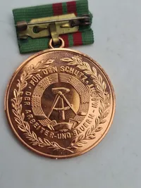 Medal 15 Years Volunteer to Protect the State Border of the GDR (2), & Medal for Faithful Service in the National People's Army