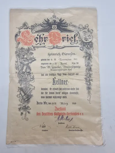 Lehrbrief, som er et historisk dokument, der bekræfter, at Heinrich Siemsen har afsluttet sin læretid som tjener (Kellner).